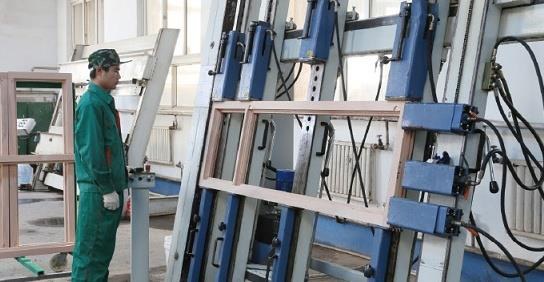 Wood frame press in plant